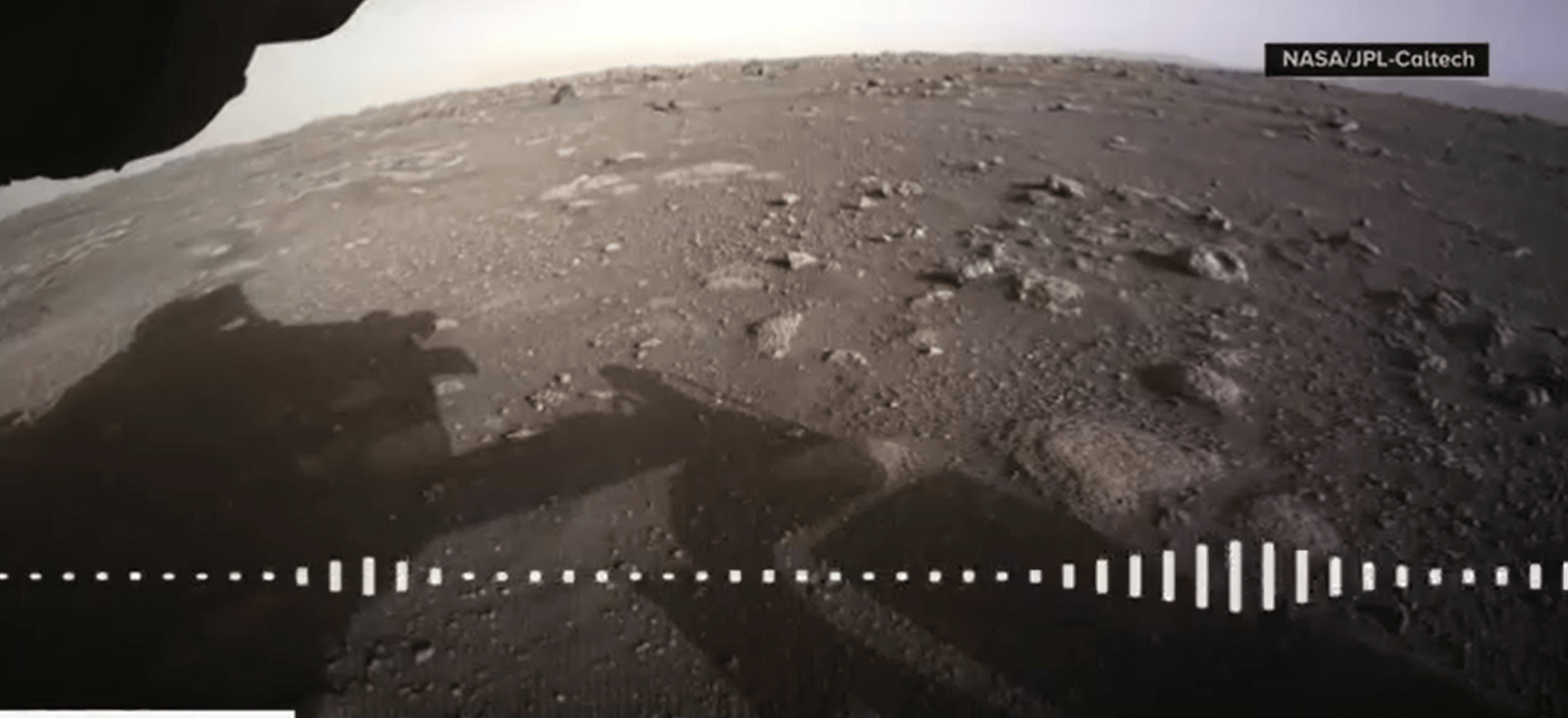 Visual of video image from Mars rover, Perseverance with overlay of waves to represent audio